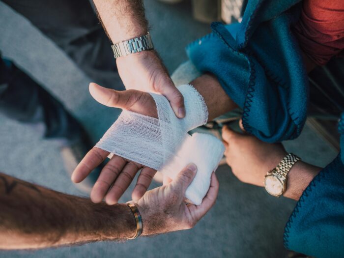 Photo by RDNE Stock project: https://www.pexels.com/photo/person-applying-bandage-on-another-person-s-hand-6519905/
