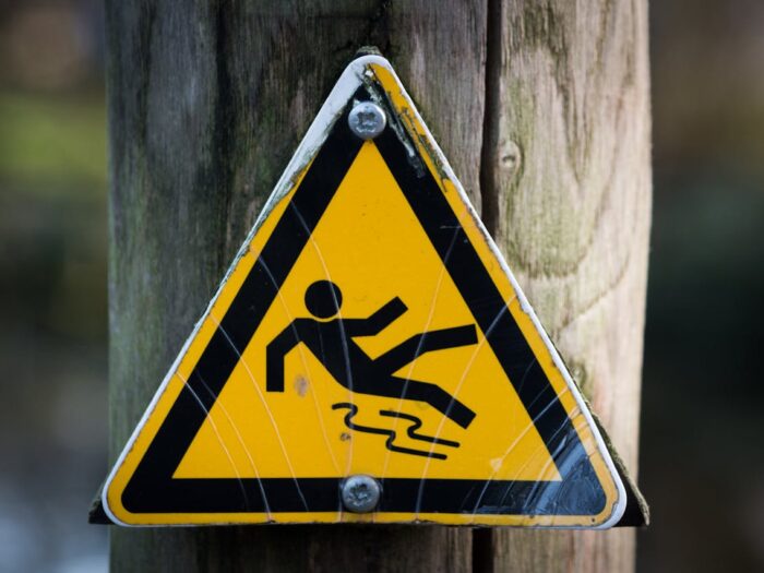 Photo by ClickerHappy: https://www.pexels.com/photo/sign-slippery-wet-caution-4341/